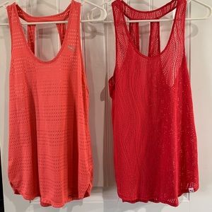 2 work out tank Sz Small. Pink and coral color